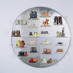  20 pieces on mirrored plexiglass shelf,  2012